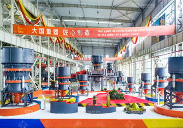 ZENITH's large equipment exhibition hall displaying cone crushers, vertical shaft impactors, and aggregate processing machinery